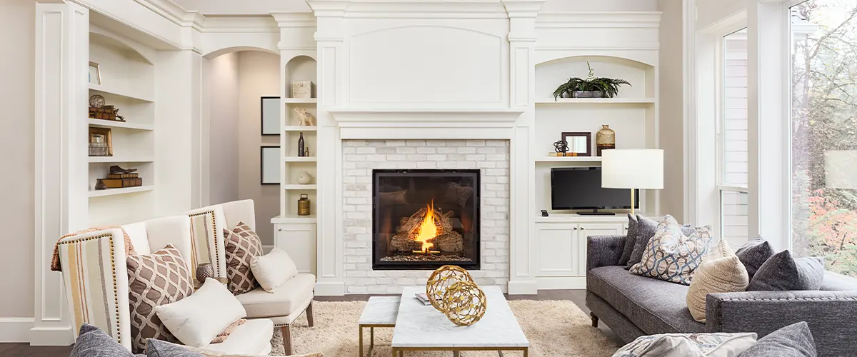 living room with fireplace and white furniture