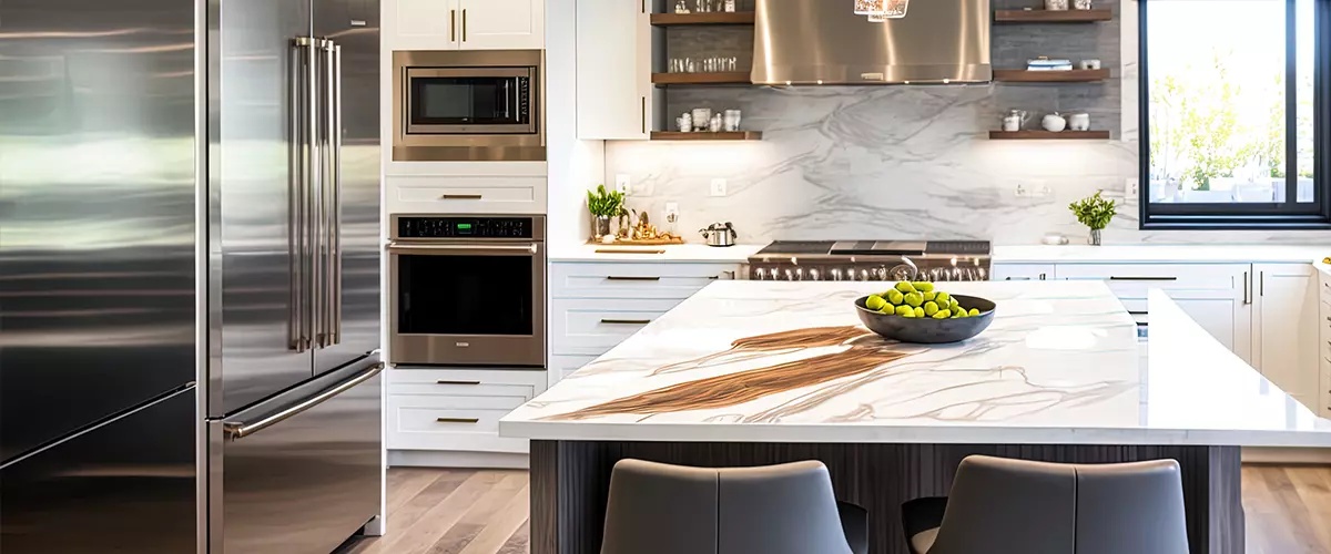 Mirrored Surfaces modern kitchen with marble white countertop and white cabinets