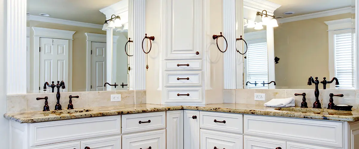 Luxury large white master bathroom cabinets with double sinks.