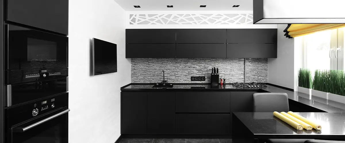 Modern kitchen interior with black Cupboard Vs Cabinet in Pasadena home.