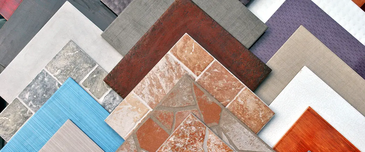 Assorted floor tile samples showcasing various colors, textures, and patterns, ideal for home renovation and interior design projects, showcasing Best Tile For Bathroom Floor